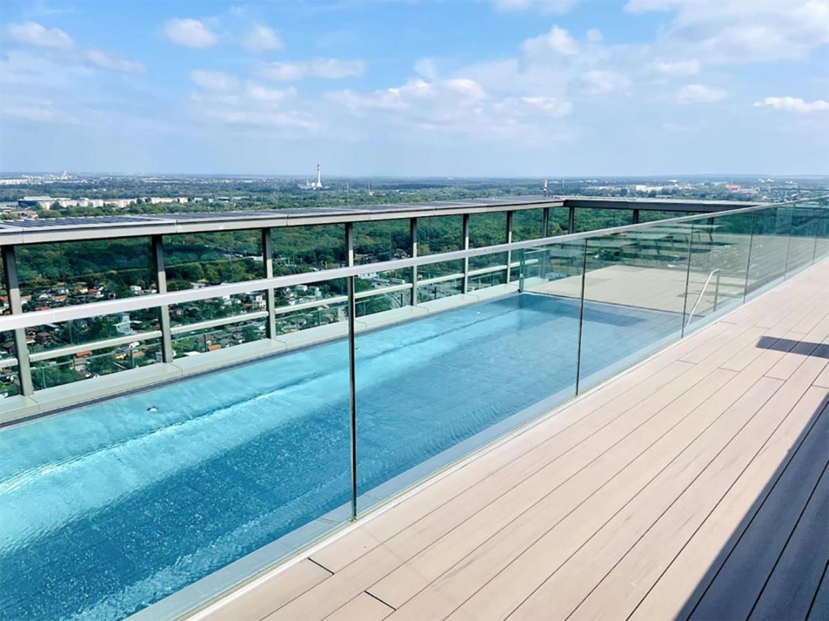Apartment Sunrise Above Sky With Rooftop Pool
